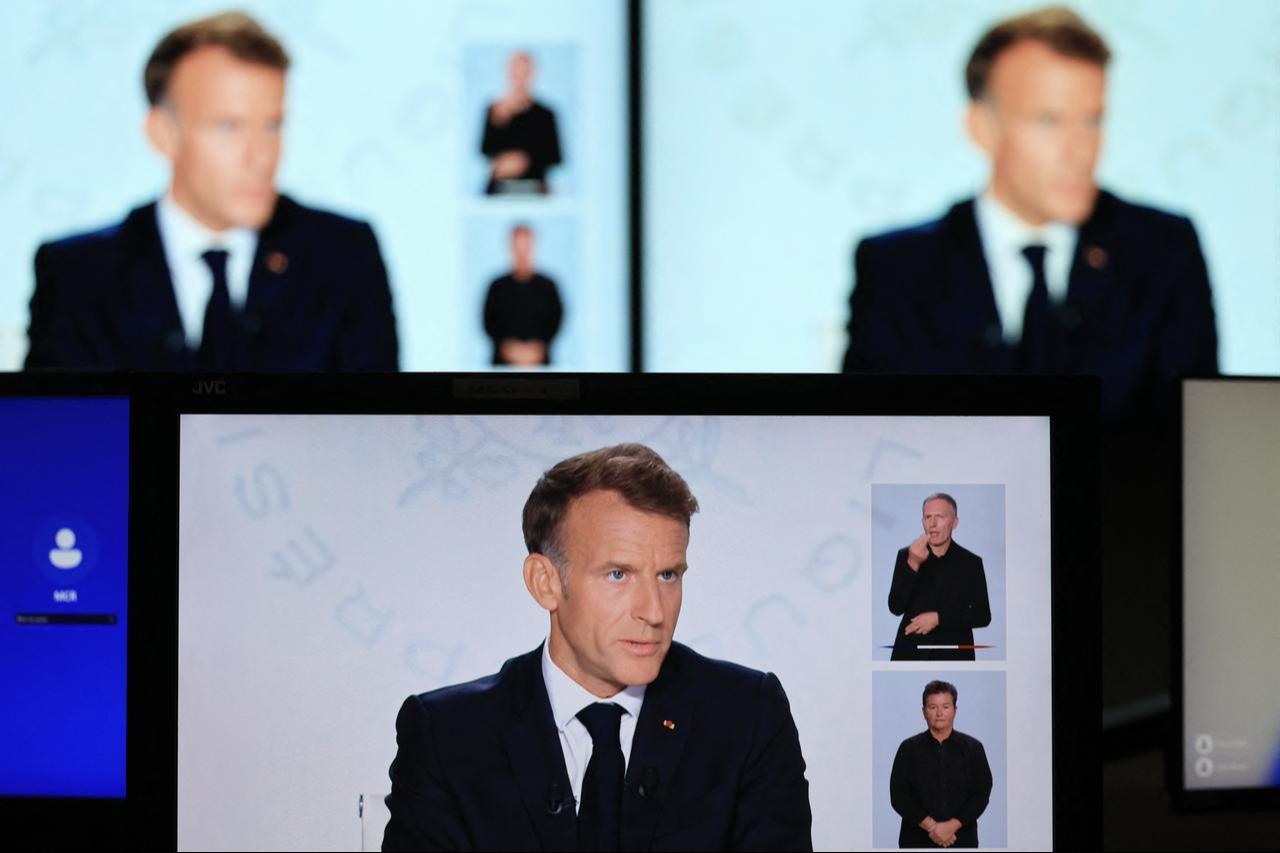 A photo shows monitor screens as France's President Emmanuel Macron speaks during an interview with France 2 and TF1 at the Elysee Presidential Palace, in Paris, Sept. 24, 2026. (AFP Photo)