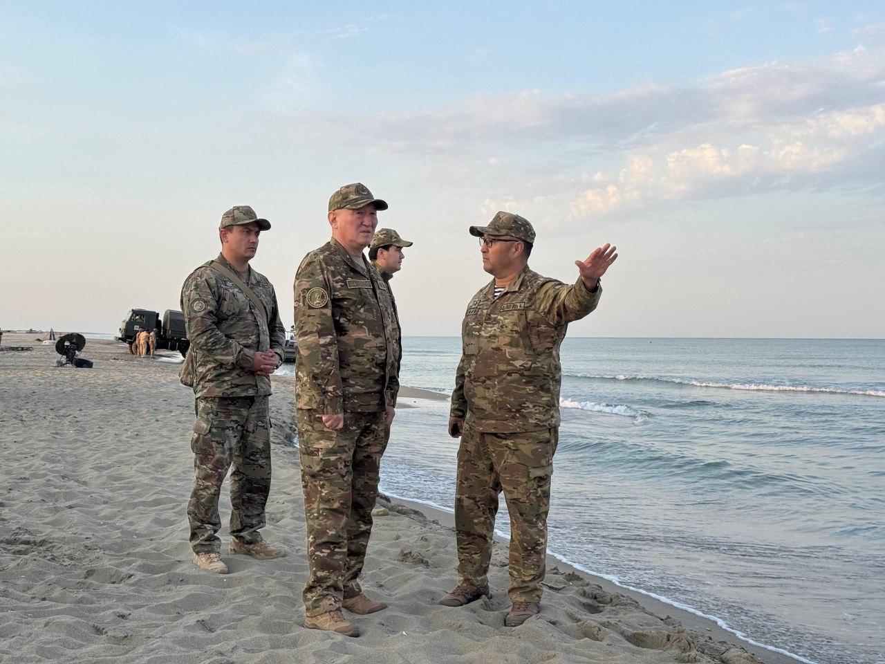Rescue divers return to shore following search and rescue operations for 17 Kazakh servicemen who were swept into the Caspian Sea by strong winds during a military exercise in Kazakhstan on September 24, 2026. (Kazakh Ministry of Defense/AA Photo)