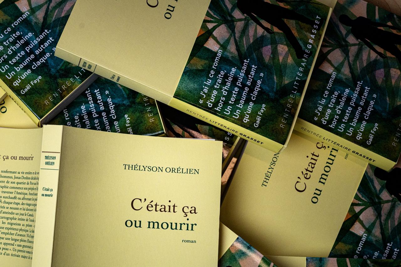 Copies of Thélyson Orélien’s novel “C’était ça ou mourir” are displayed during Les Correspondances de Manosque literary festival in Manosque, France, Sept. 24, 2026. (AFP Photo)