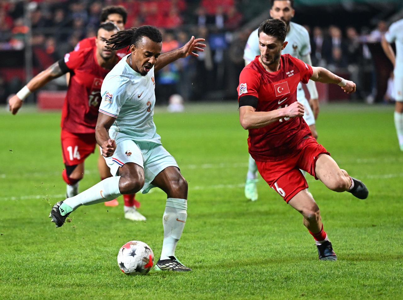 Jules Kounde (5) of France in action against Ismail Yuksek (5) of Türkiye during the UEFA Nations League A League Group 1 match between Türkiye and France at Kocaeli Stadium in Kocaeli, Türkiye, on September 25, 2026. (AA Photo)