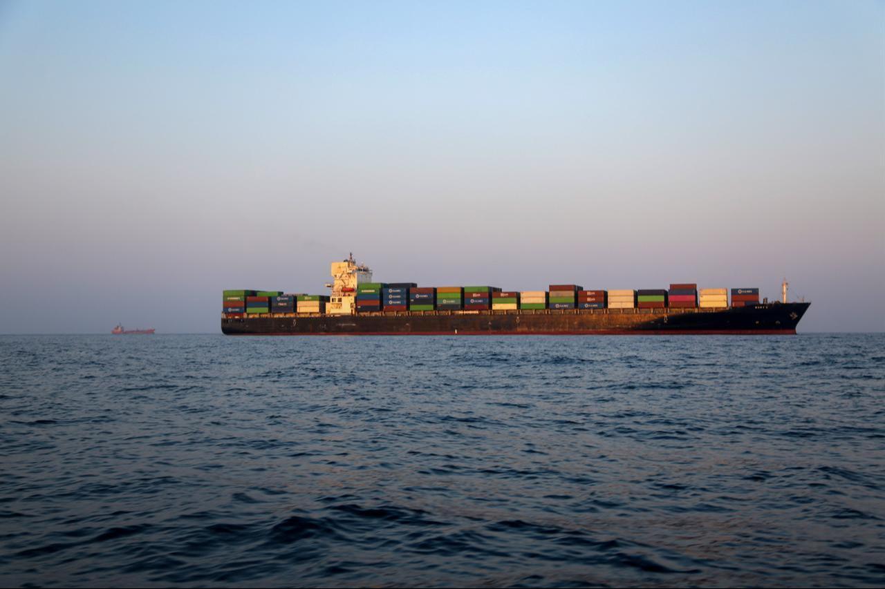 Commercial vessels are seen anchored between Iran’s Qeshm and Larak islands amid disruptions to maritime traffic in the Strait of Hormuz, Iran, on Sept. 11, 2026. (AA Photo)