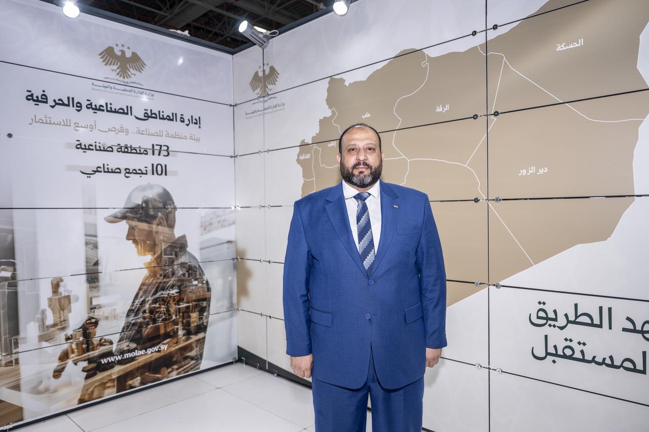 Ali Alhamad, public relations director at Syria’s Ministry of Local Administration and Environment’s Directorate of Industrial and Craft Zones, poses at the ministry’s exhibition stand during MUSIAD EXPO 2026 in Istanbul, Türkiye, Sept. 26, 2026. (AA Photo)