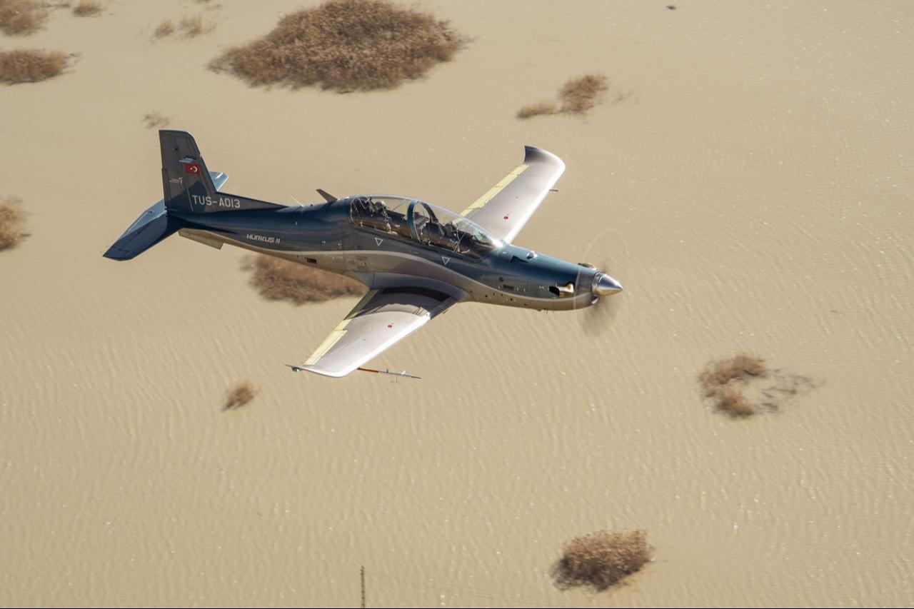 The photo shows the Turkish Aerospace Industries (TAI) Hurkus-II next-generation basic trainer aircraft during a flight at an unspecified location and time. (Photo via X/@Catfishtheblues)