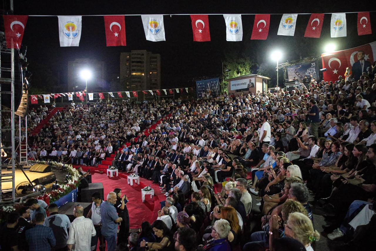 Audiences attend the opening ceremony of the 33rd International Adana Golden Boll Film Festival at Merkez Park Amphitheater in Adana, Türkiye, Sept. 26, 2026. (AA Photo)