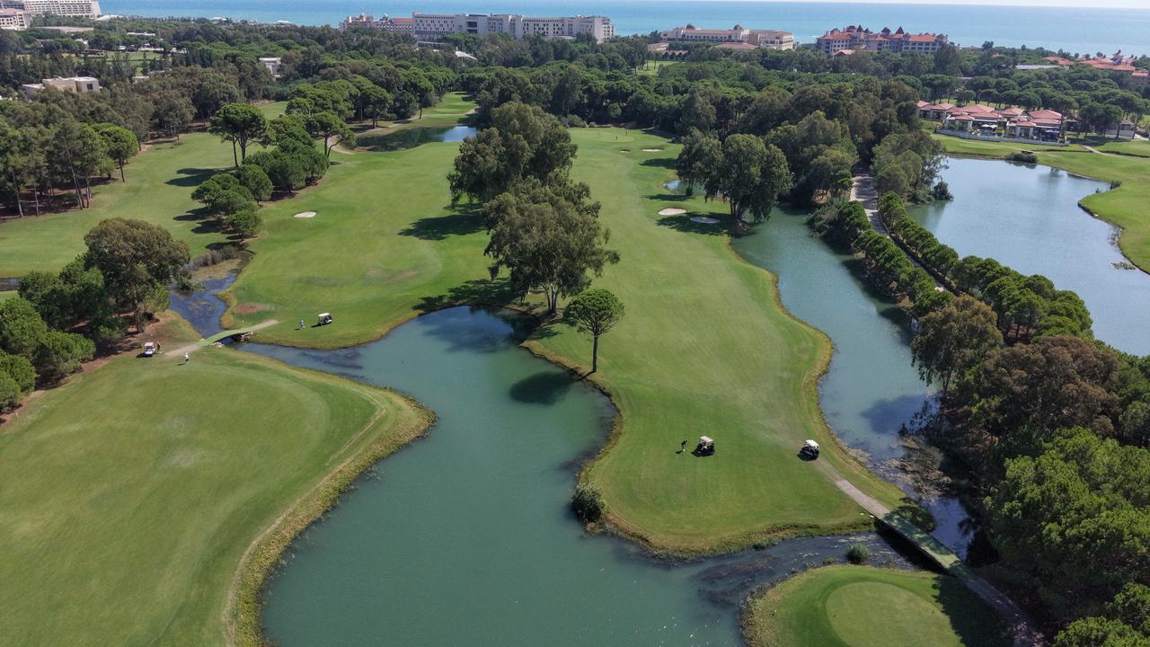 Aerial view shows a golf course surrounded by trees and water features as golf tourism activity begins to increase in Antalya, on Sept. 24, 2026, in Antalya, Türkiye. (AA Photo)