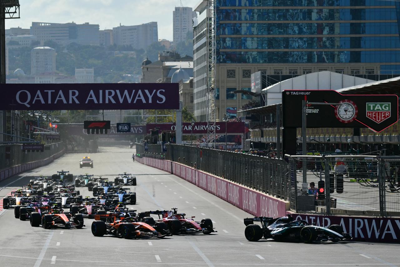 Formula One cars race past Baku's historic city walls during the Azerbaijan Grand Prix at the Baku City Circuit in Baku, Azerbaijan, Sept. 26, 2026. (AFP Photo)