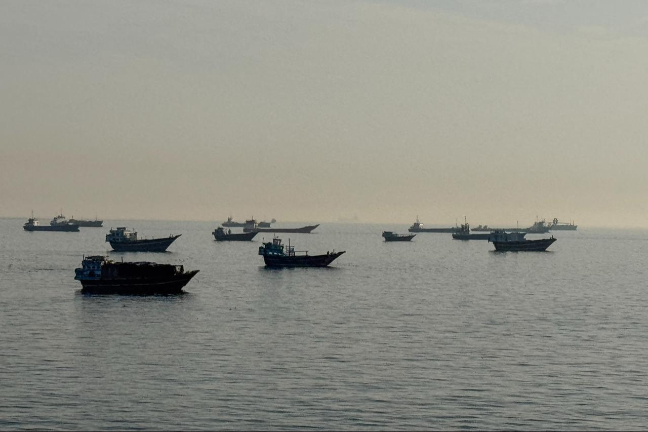 Vessels are seen anchored in the Strait of Hormuz, off the port city of Khasab on Oman’s northern Musandam Peninsula on May 17, 2026. (AFP Photo)