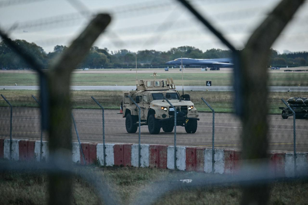 An armored vehicle (C) patrols the interior at RAF Fairford base in Fairford, south-west England, on September 28, 2026. (AFP Photo)