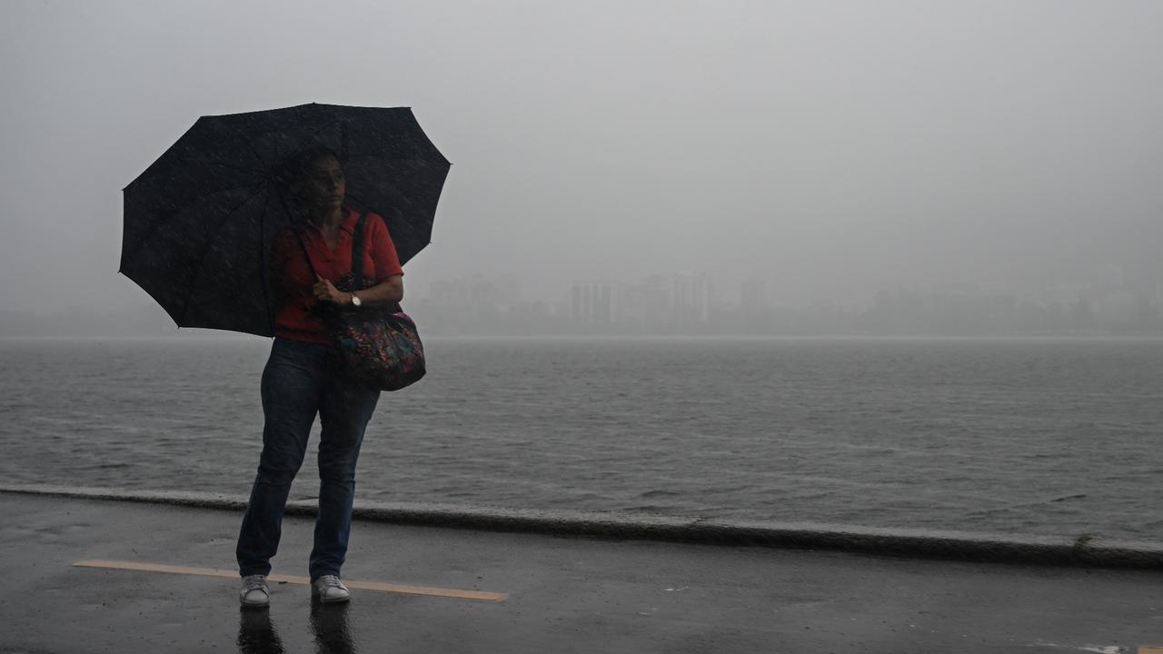 Gray skies replace sunshine on Rio beaches amid record rain