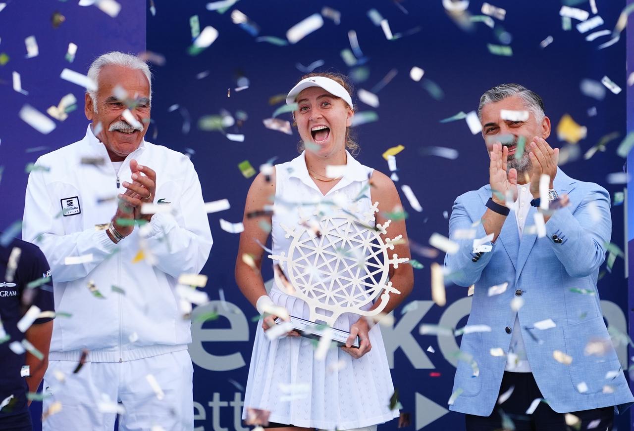 Turkish tennis player Berfu Cengiz celebrates with her trophy after defeating Serbia's Teodora Kostovic to win the Turk Telekom Ankara Open WTA 125 singles title in Ankara, Türkiye, Sept. 27, 2026. (AA Photo)