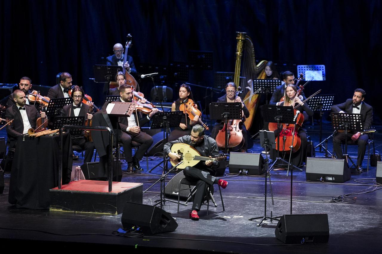 An oud player performs with the National Arab Orchestra during its concert at Istanbul's Ataturk Cultural Center, Türkiye, Sept. 27, 2026. (AA Photo)