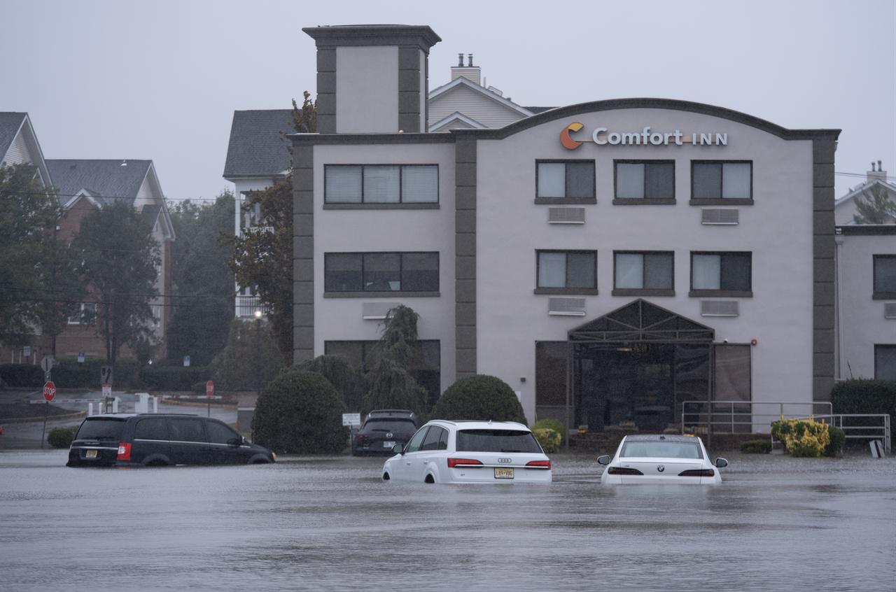 Vehicles are submerged outside the Comfort Inn Edgewater as flooding from a nor'easter affects Edgewater, New Jersey, U.S., Sept. 26, 2026. (AA Photo)