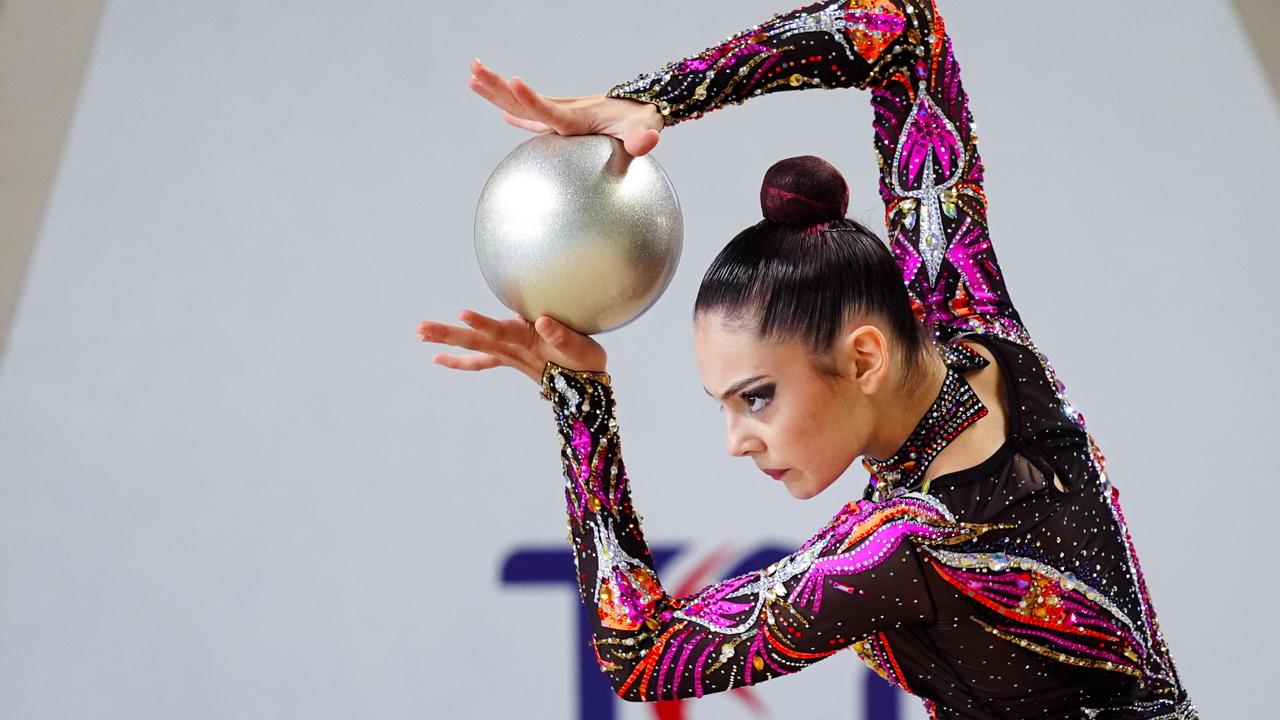 Rhythmic gymnasts compete across age groups in Ankara