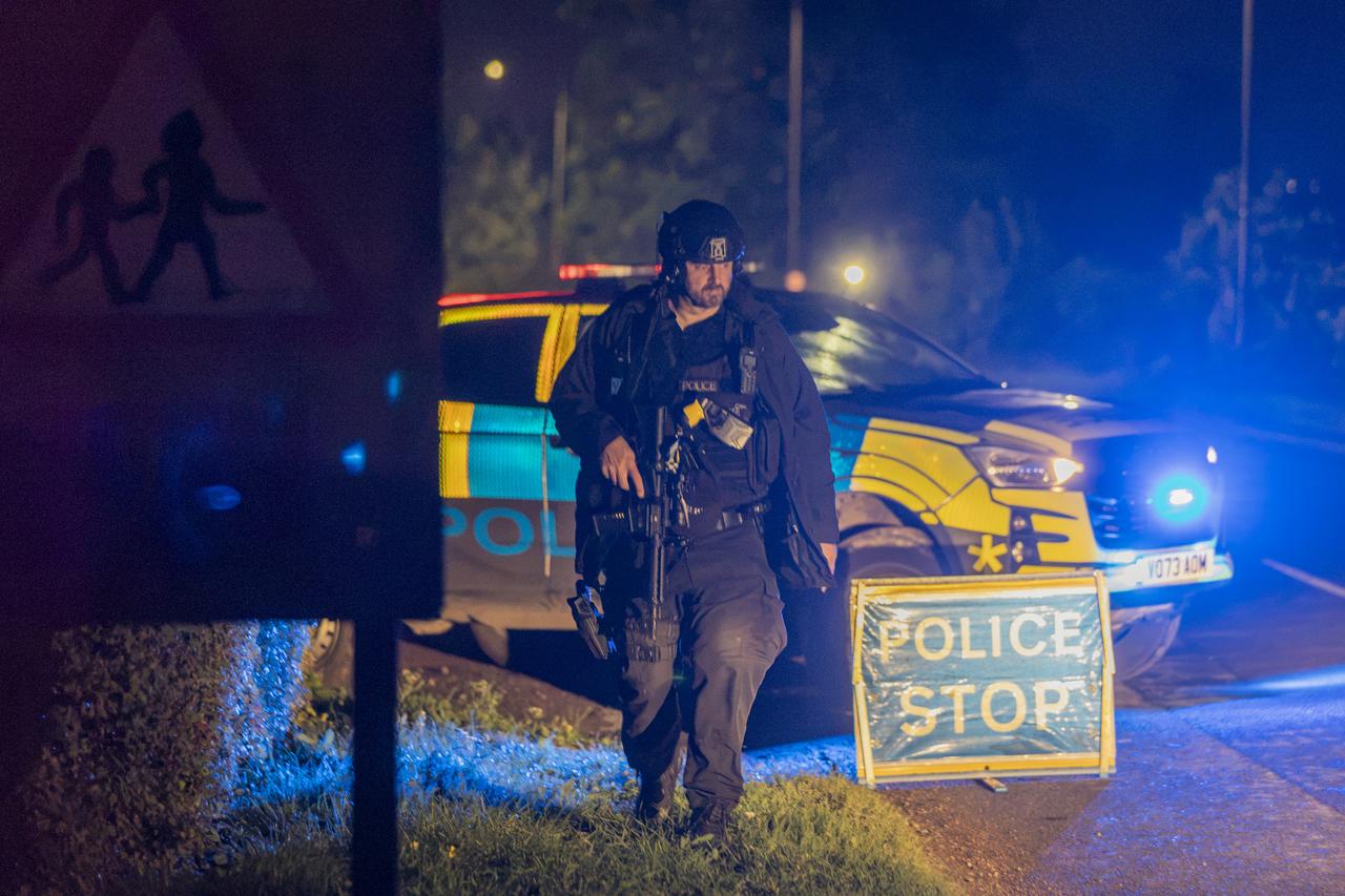 Armed police maintain road blocks and security checks around RAF Fairford, Gloucestershire, United Kingdom, after a major incident was declared on September 27, 2026. (AA Photo)
