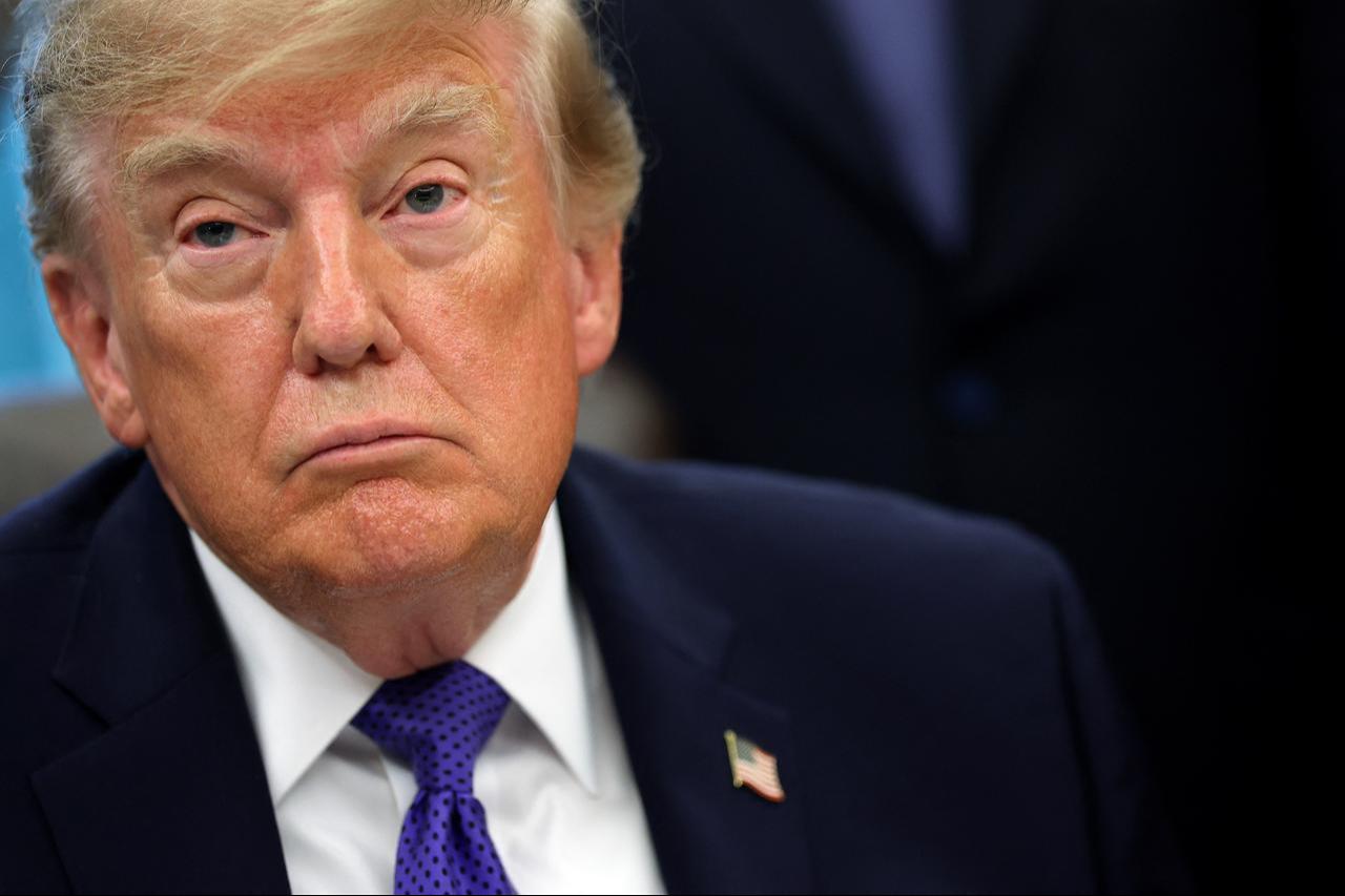U.S. President Donald Trump listens to a reporter's question in the Oval Office at the White House on September 28, 2026, in Washington, DC. (AFP Photo)