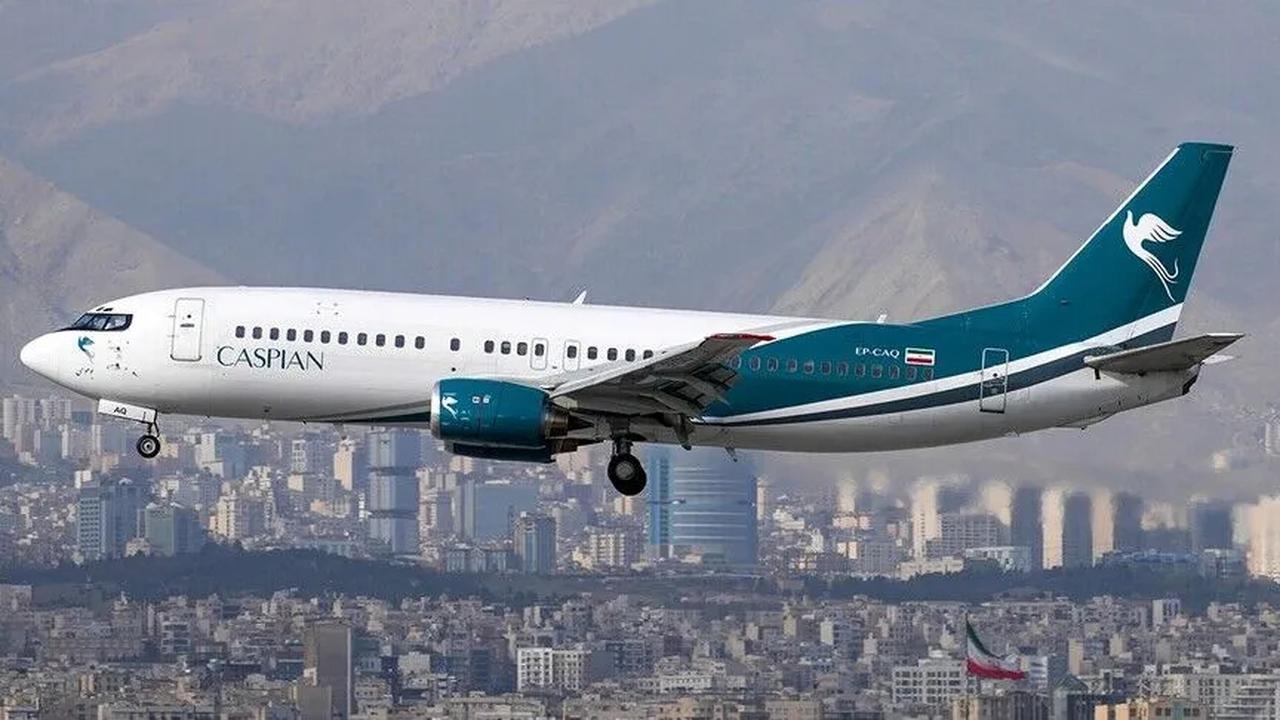 Caspian Airlines Boeing 737 aircraft flies over Tehran, Iran. (AA Photo)