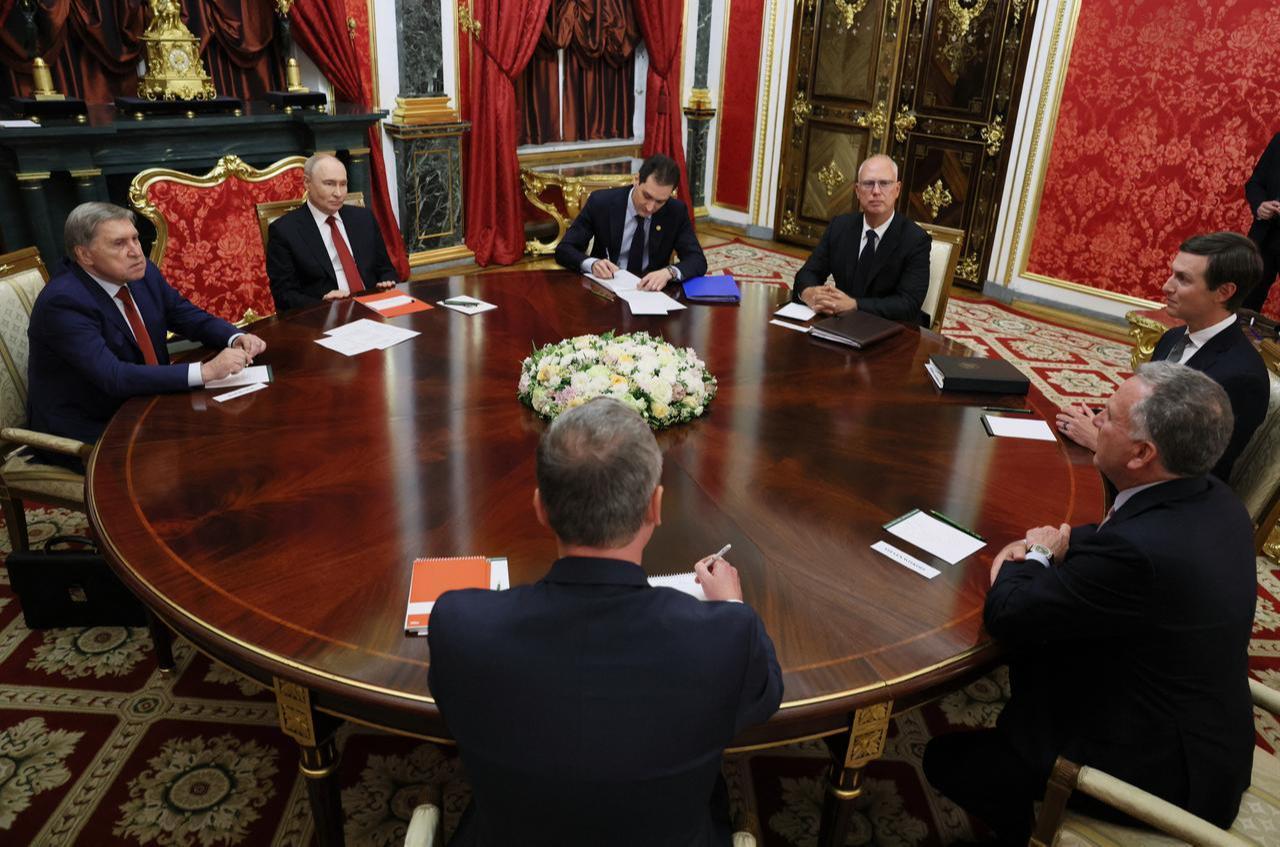 In this pool photograph distributed by the Russian state agency Sputnik, Russia's President Vladimir Putin (2nd L), Kremlin foreign policy aide Yuri Ushakov (L) and Russia's presidential envoy Kirill Dmitriev (4th L) attend a meeting with US special envoy Steve Witkoff (R) and US President Donald Trump's son-in-law Jared Kushner (2nd R) in Moscow on September 5, 2026. (Photo by Sputnik / AFP)