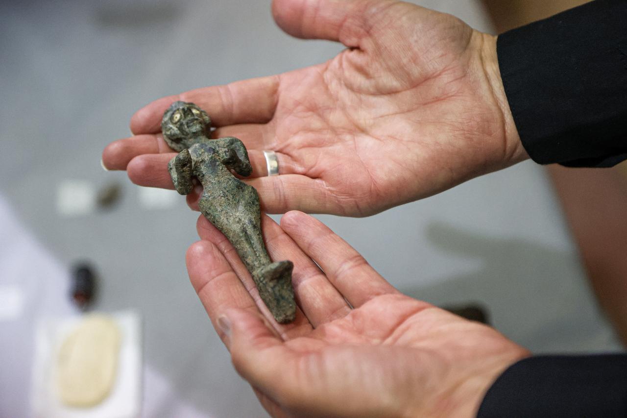 A returned archaeological figurine is displayed at the National Museum of Damascus after 21 artifacts were repatriated from the United States to Syria, Damascus, Syria, Sept. 29, 2026. (AA Photo)