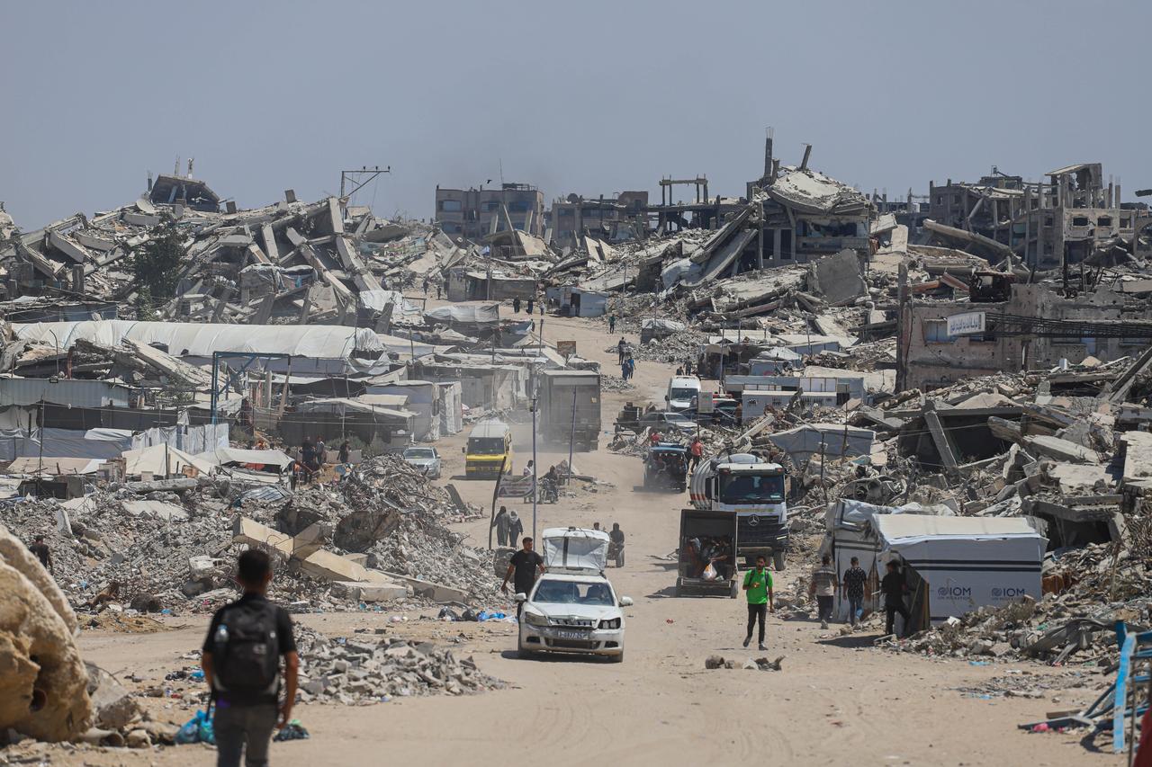 Displaced Palestinian families try to survive under harsh living conditions among the rubble of damaged and destroyed buildings in Beit Lahia, in the northern Gaza Strip, Palestine, on August 18, 2026. (AA Photo)