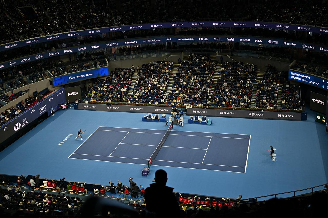 Serbia's Novak Djokovic hits a return to Portugal's Nuno Borges during their men's singles first-round match at the China Open tennis tournament in Beijing on September 30, 2026. (AFP Photo)