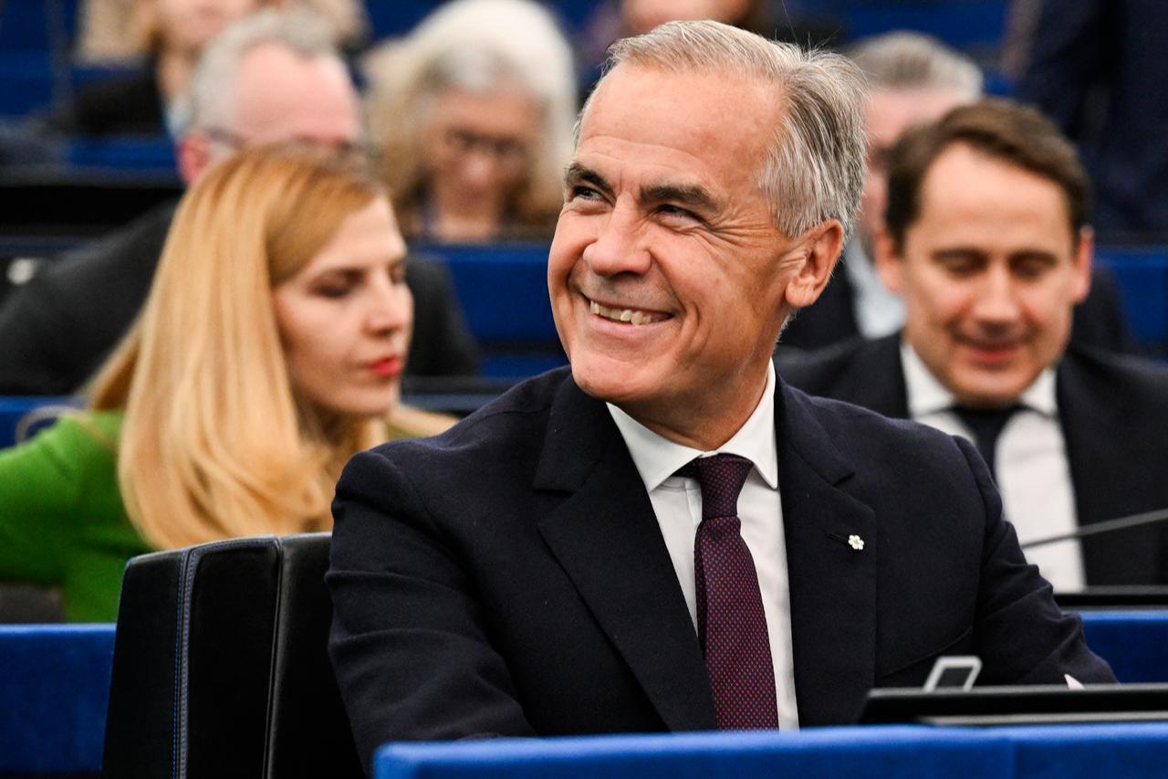 Canada's Prime Minister Mark Carney smiles as he listens to the European Commission President delivering a speech during her annual State of the Union address at a plenary session of the European Parliament in Strasbourg, eastern France, on September 16, 2026. (AFP Photo)