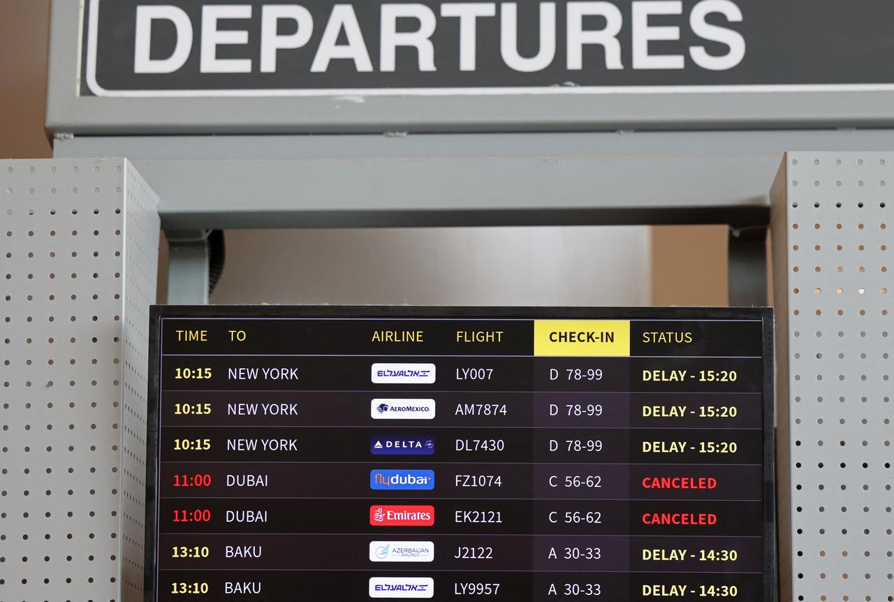 A flight information display board shows cancelled flights to Dubai, at the Ben Gurion Airport near Tel Aviv on September 30, 2026. (AFP Photo)
