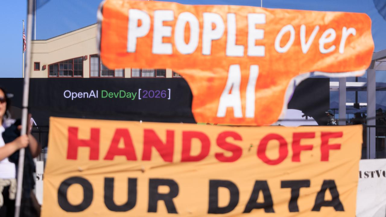 Protesters march outside DevDay opposing OpenAI's military and ICE partnerships