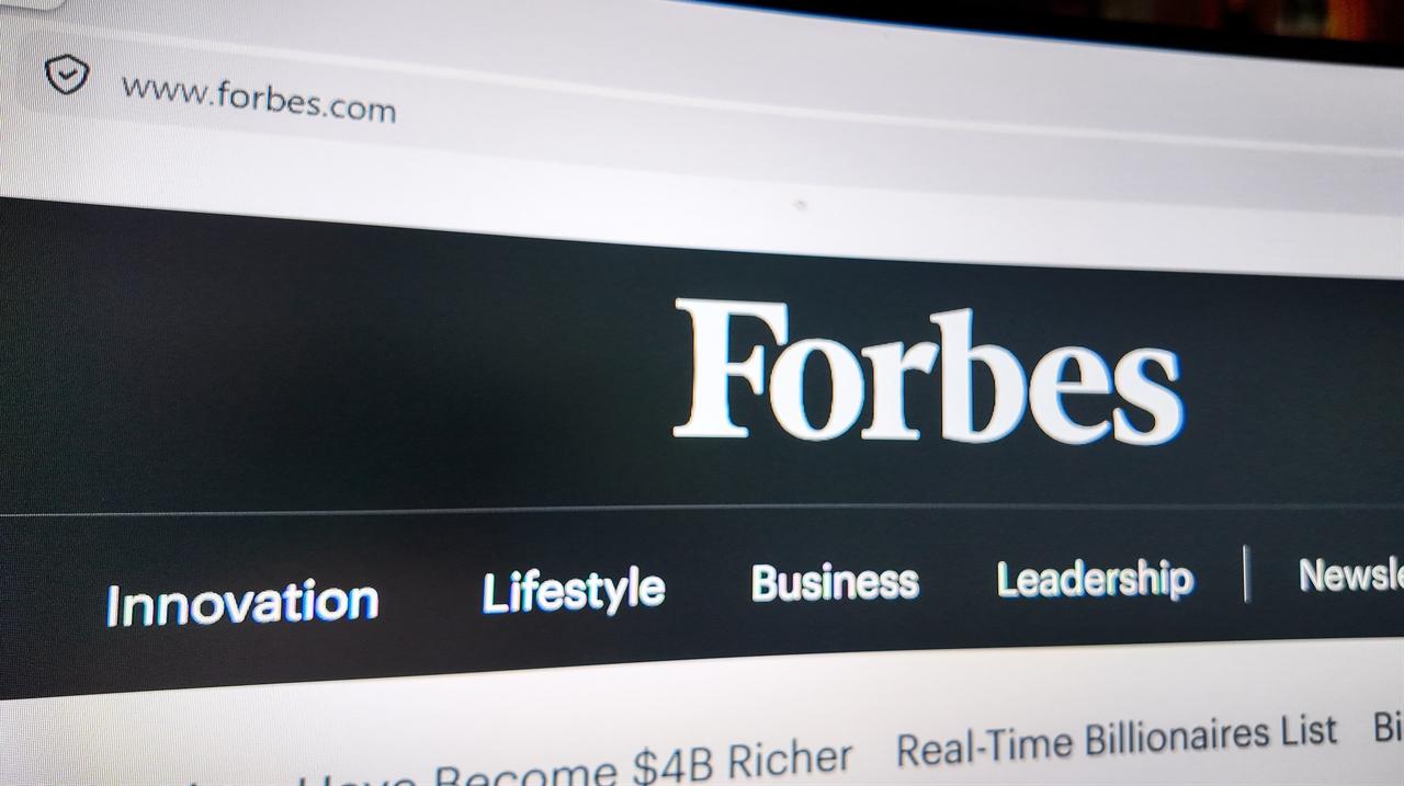 Internet browser window with Forbes website. (Photo via Adobe Stock)