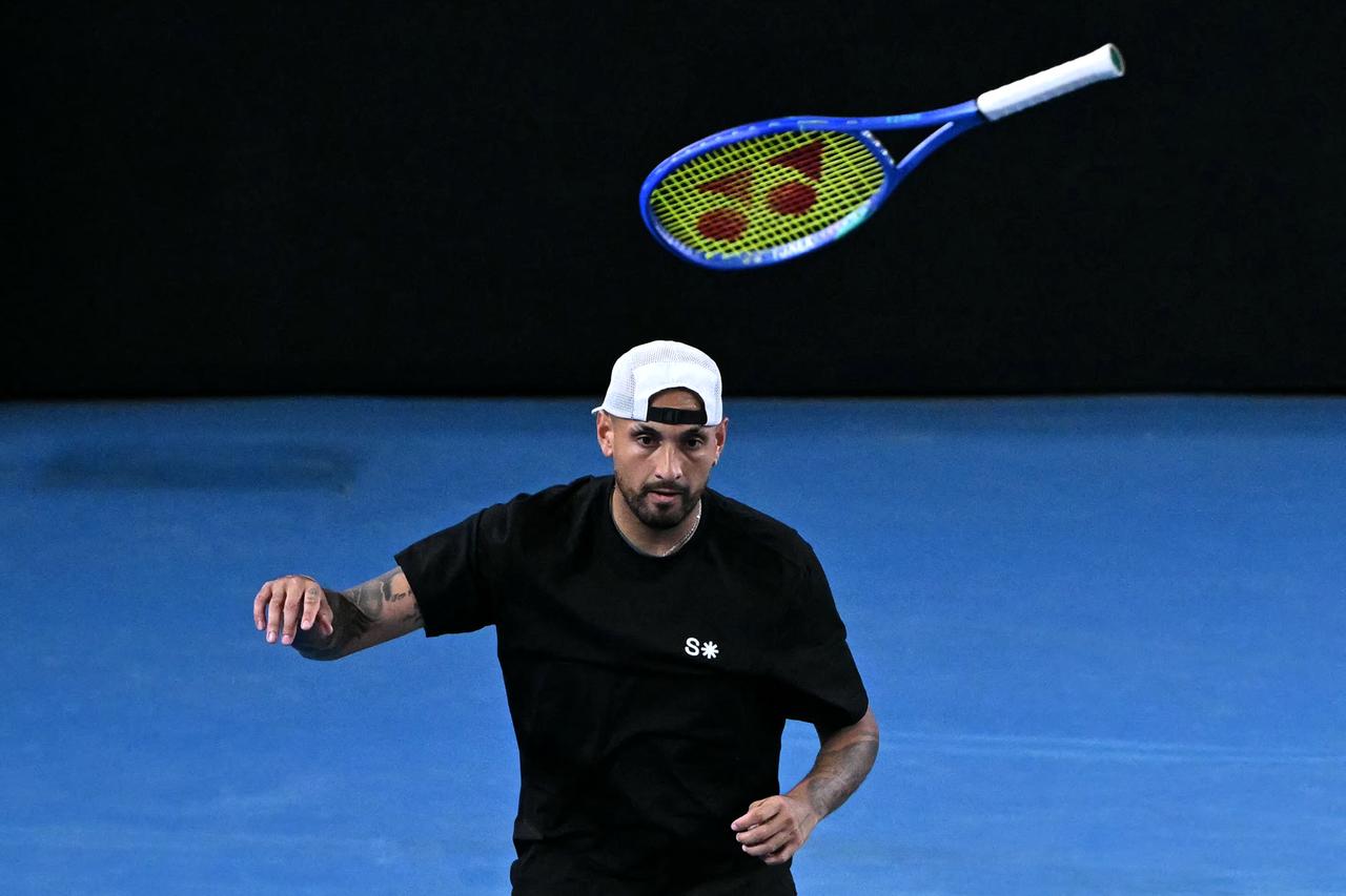 Kyrgios throws his racket during a match at the Australian Open tennis tournament in Melbourne on January 22, 2026. (AFP Photo)