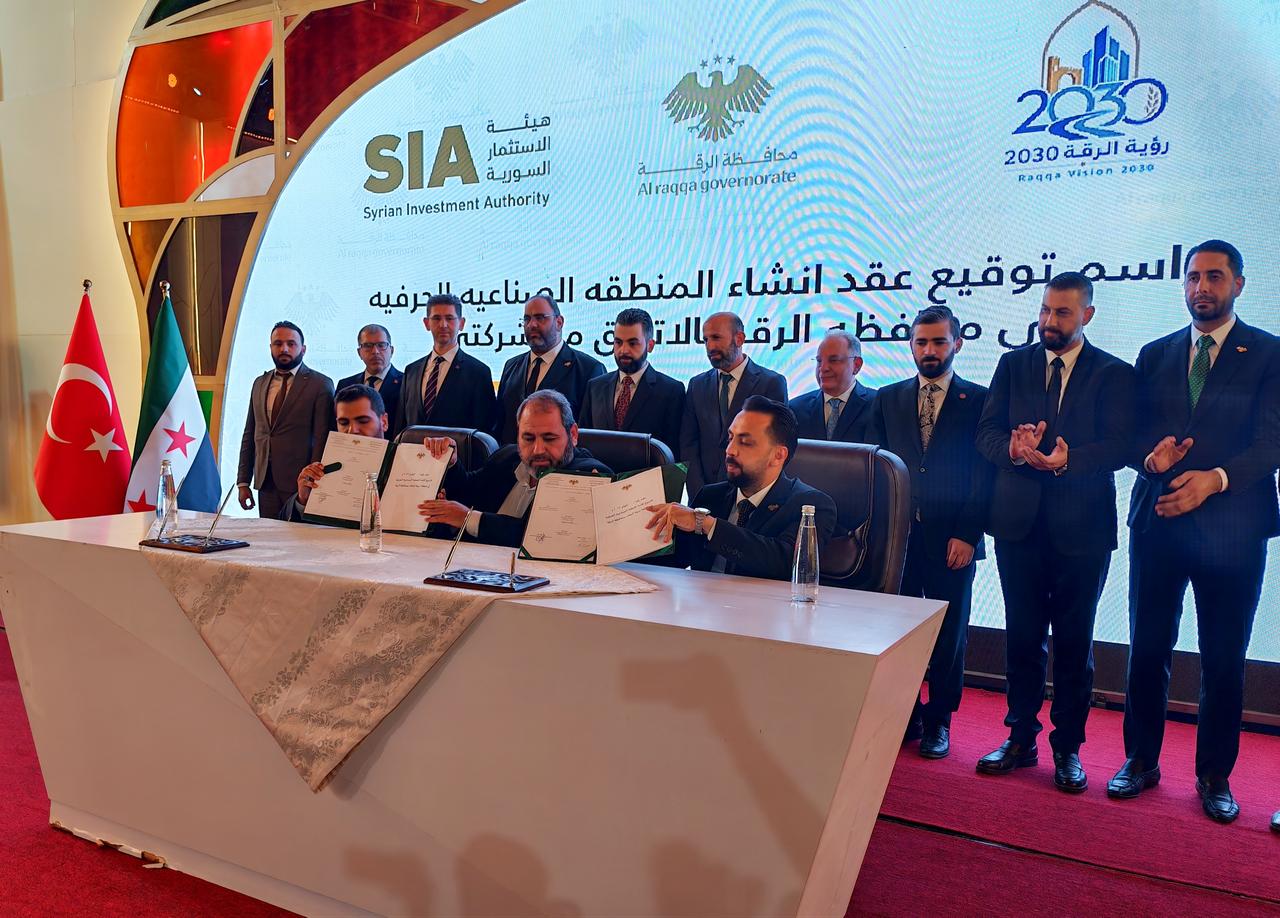 Officials pose during the signing ceremony for an agreement between Syria’s Raqqa governorate, the Syrian Investment Authority and Turkish companies to establish an industrial and craft zone in Raqqa, Sept. 3, 2026. (AA Photo)