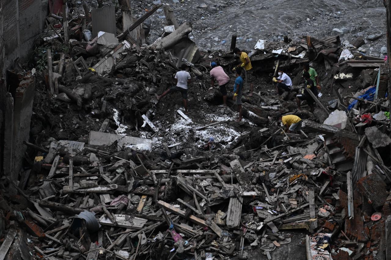 Residents search through debris after flooding and landslides damaged homes in Nepal, Sept. 3, 2026. (AFP Photo)