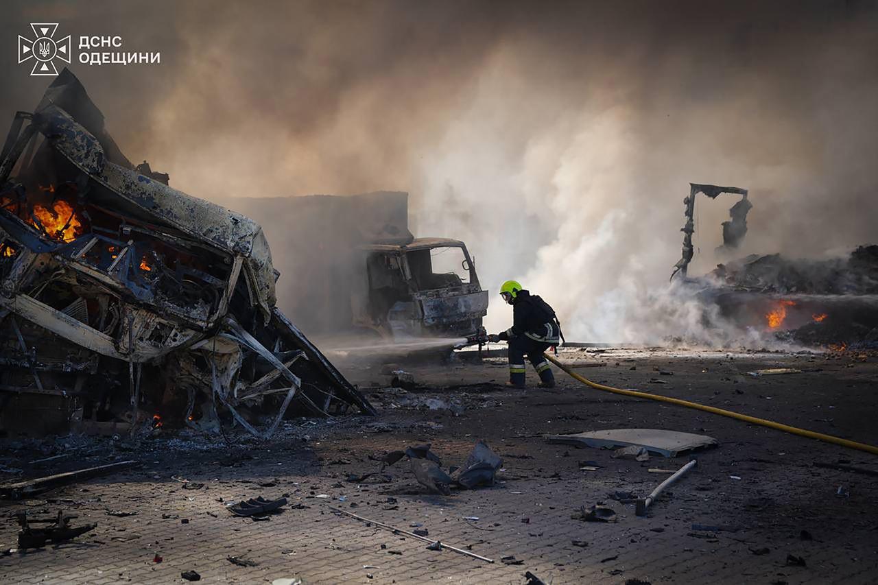 In this handout photograph taken and released by the Ukrainian Emergency Service on September 4, 2026, a Ukrainian rescuer works to extinguish a fire at the site of an air attack at an undisclosed location in the Odesa region. (Photo by Handout / UKRAINIAN EMERGENCY SERVICE / AFP)