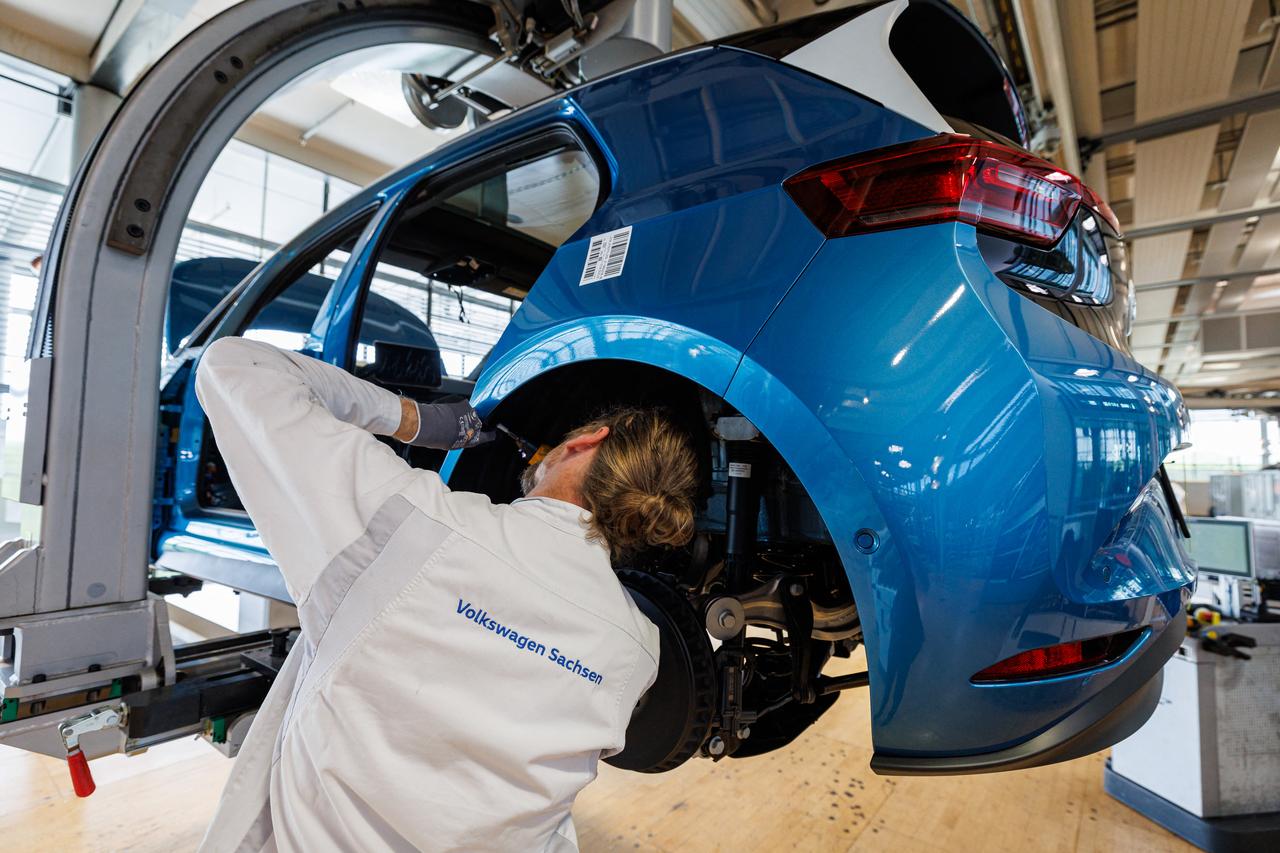 Employees work on the assembly line for the Volkswagen (VW) ID.3 electric car on September 3, 2026. (AFP Photo)