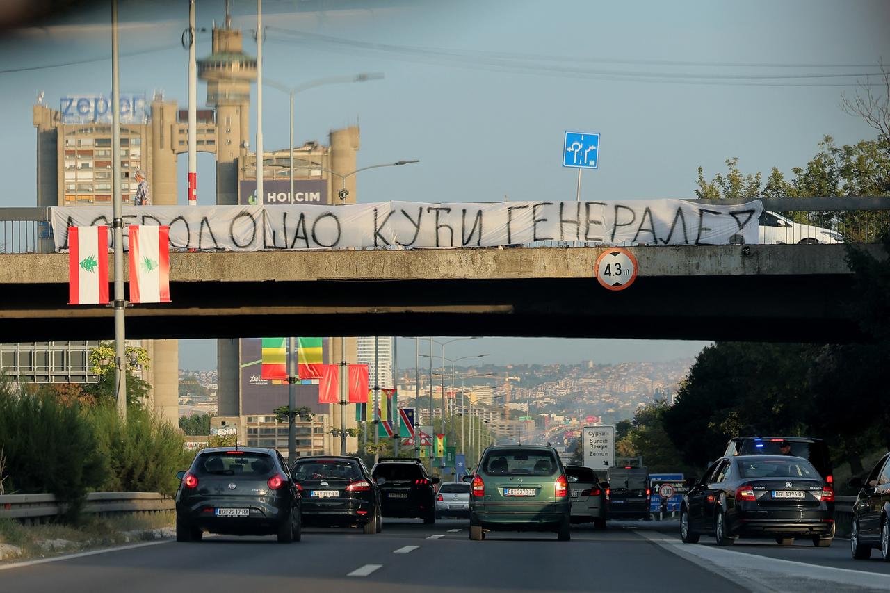 A banner reading "Welcome Home, General" is displayed on a footbridge over a motorway as a convoy carrying the body of Bosnian Serb war criminal Ratko Mladic passes through Belgrade, Serbia, on September 3, 2026. (AFP Photo)