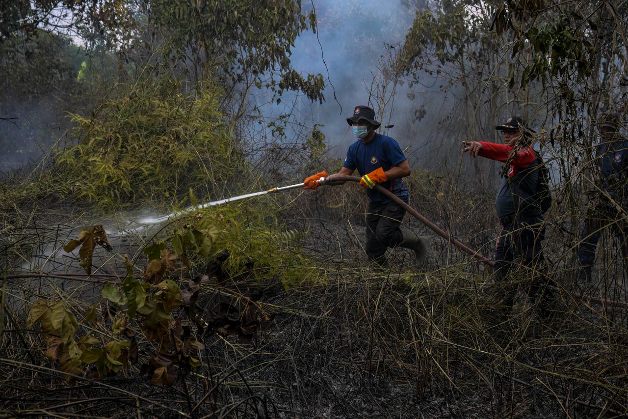 Indonesia deploys water bombing to protect future capital from wildfires