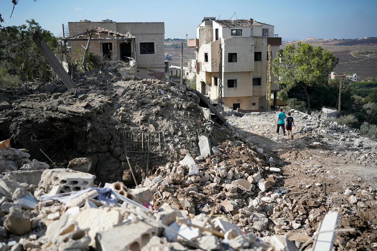 Residents inspect the destruction the morning after a night airstrike by the Israeli military that targeted the southern Lebanese village of Mayfadoun on September 5, 2026. (AFP Photo)