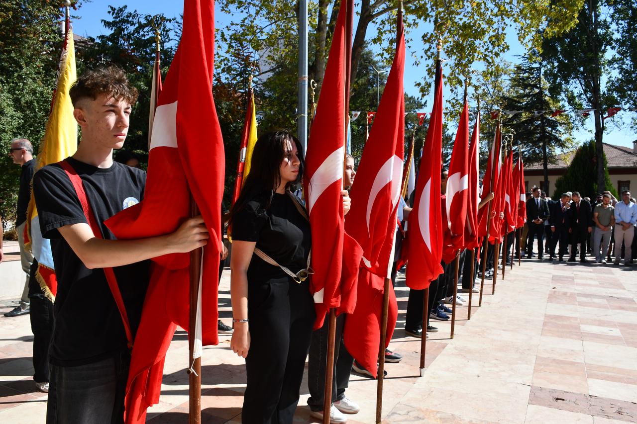 Students hold Turkish flags during the ceremony commemorating the 104th anniversary of Bilecik's liberation from enemy occupation. (AA Photo)