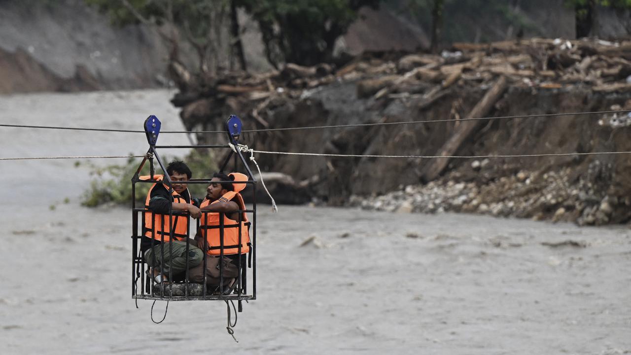 Nepal rescuers save 4 survivors as flood search enters 12th day