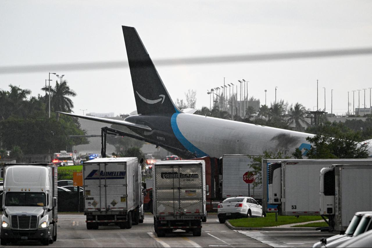 The tail section of a cargo plane is seen at Miami International Airport after it overran the runway at Miami International Airport in Miami, Florida, September 6, 2026. (AFP Photo)