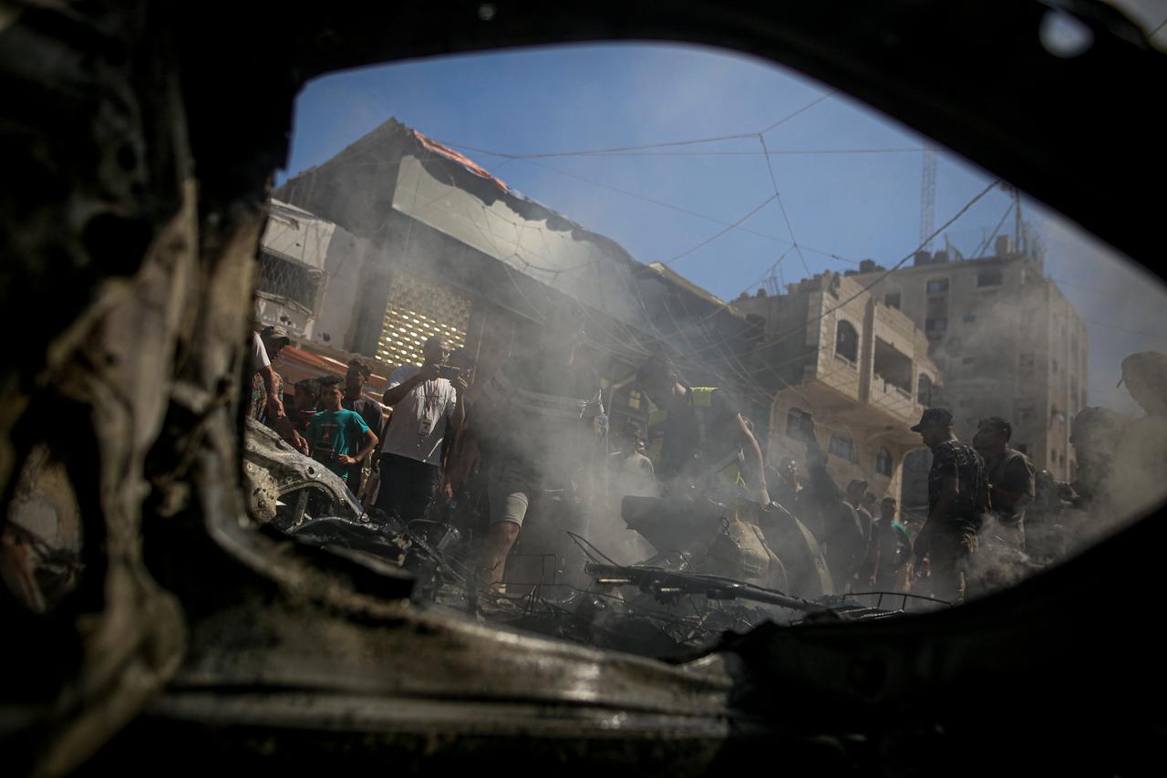 Firefighters respond to a fire that broke out in a vehicle after Israeli forces targeted a moving vehicle in the Tel al-Hawa area of Gaza City despite a ceasefire, in Gaza, Palestine, on August 31, 2026. (AA Photo)