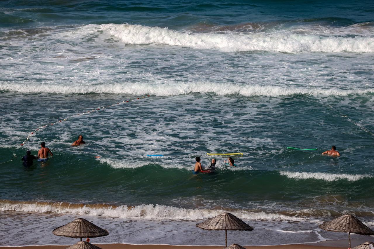 People swimming on a beach in Istanbul, Türkiye, Aug. 11, 2022. (AA Photo)