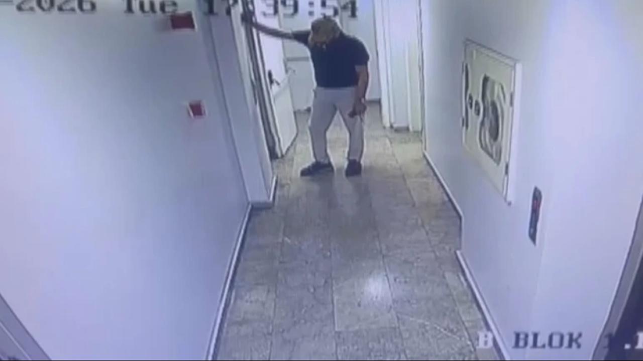 A screenshot from CCTV footage shows actor Serhat Mustafa Kilic leaning against a wall. (Photo via X/@bpthaber)