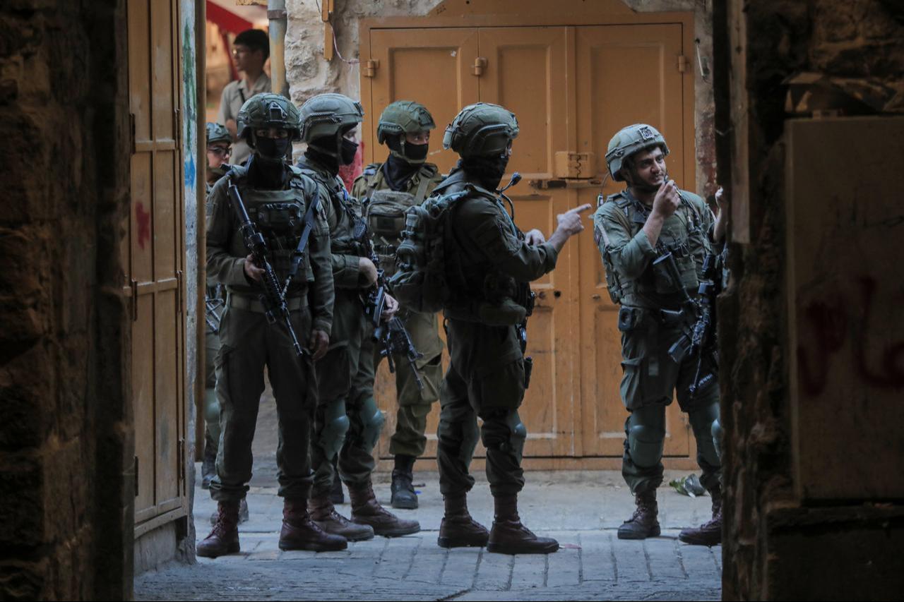 Israeli forces restrict Palestinians' movement in the area by blocking entrances and exits with metal barriers in Hebron, West Bank, Palestine, Sept. 5, 2026. (AA Photo)