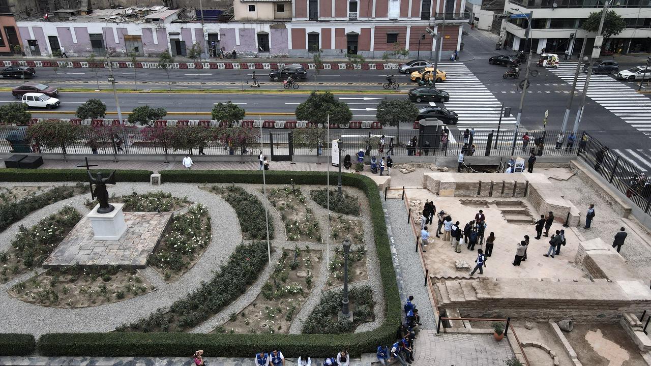 A group of researchers display the archaeological remains of the former colonial hospital discovered on August 25, 2026, in Lima, Peru. (AA Photo)