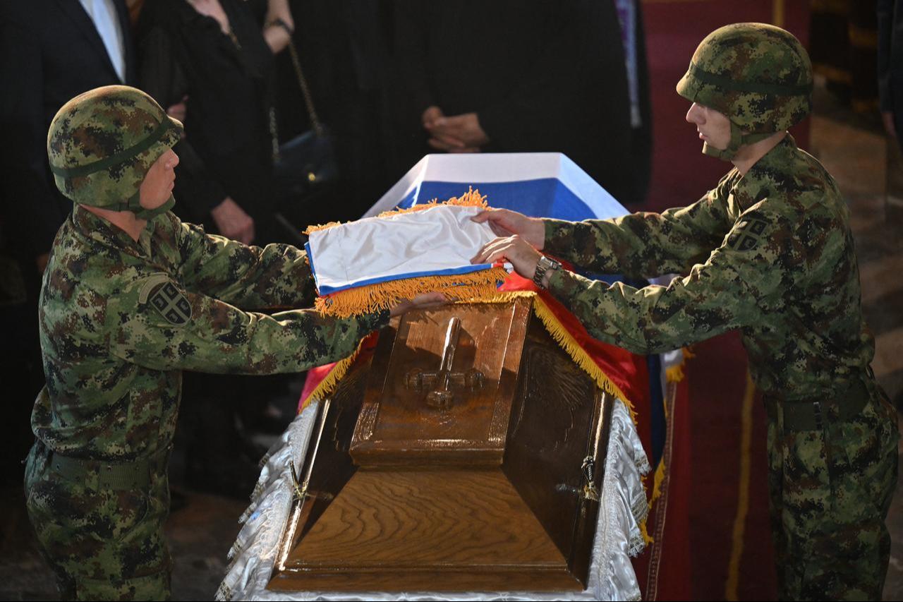 Serbian armed forces gesture above the coffin of convicted war criminal Ratko Mladic during a funeral ceremony at St Lukas church in Belgrade on September 7, 2026. (AFP Photo)