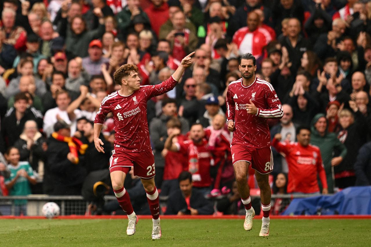 Liverpool's Spanish midfielder #23 Victor Munoz (L) celebrates scoring the team's second goal during the English Premier League football match between Liverpool and Nottingham Forest at Anfield in Liverpool, north west England, August 29, 2026. (AFP Photo)