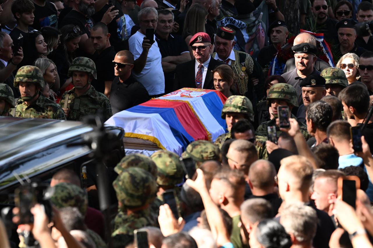 A large crowd gathers for a funeral procession at a cemetery during the funeral ceremony for war criminal Ratko Mladic in Belgrade, September 7, 2026. (AFP Photo)