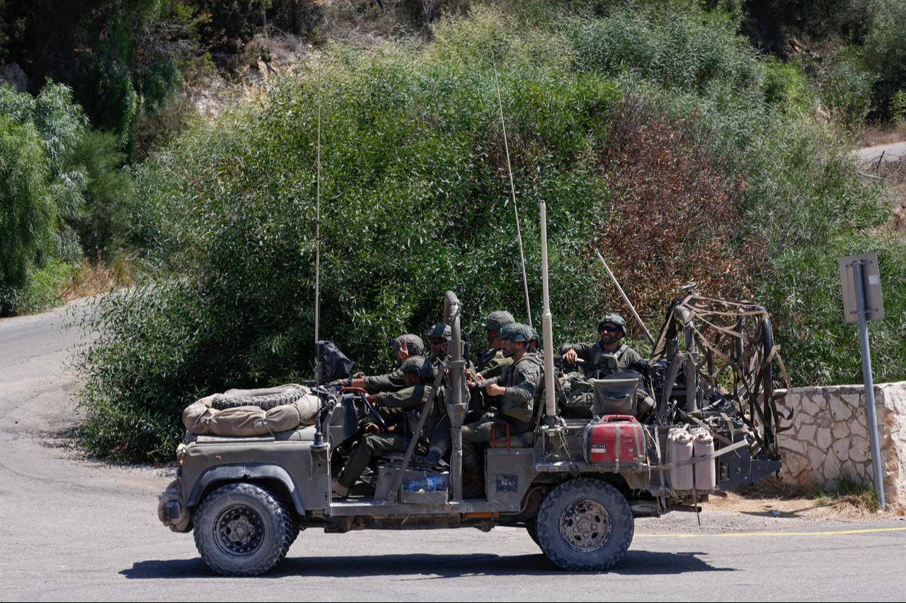 Israeli troops drive along the road in a vehicle as they prepare to enter south Lebanon, in Rosh HaNikra, northern Israel bordering Lebanon on September 4, 2026. (AFP Photo)