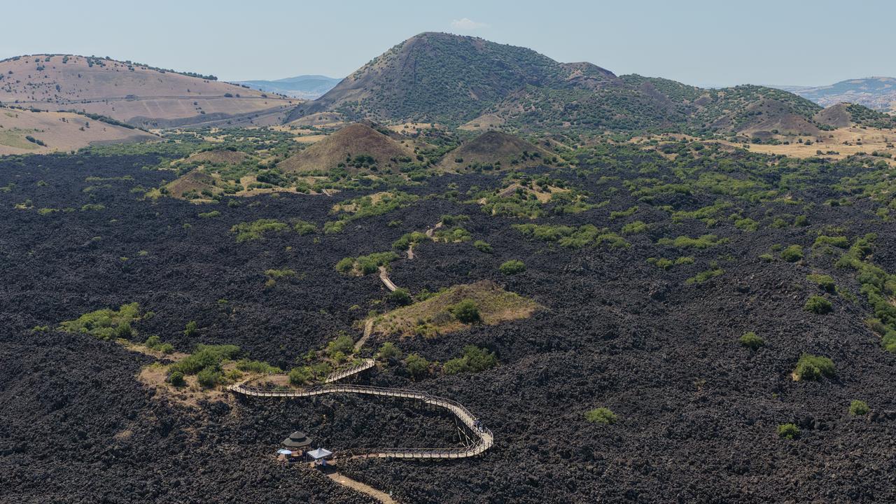 Volcanic cones and extensive lava fields stretch across the landscape of Kula in western Türkiye, where the documentary "Muhurlu Topraklar" is being filmed. (AA Photo)