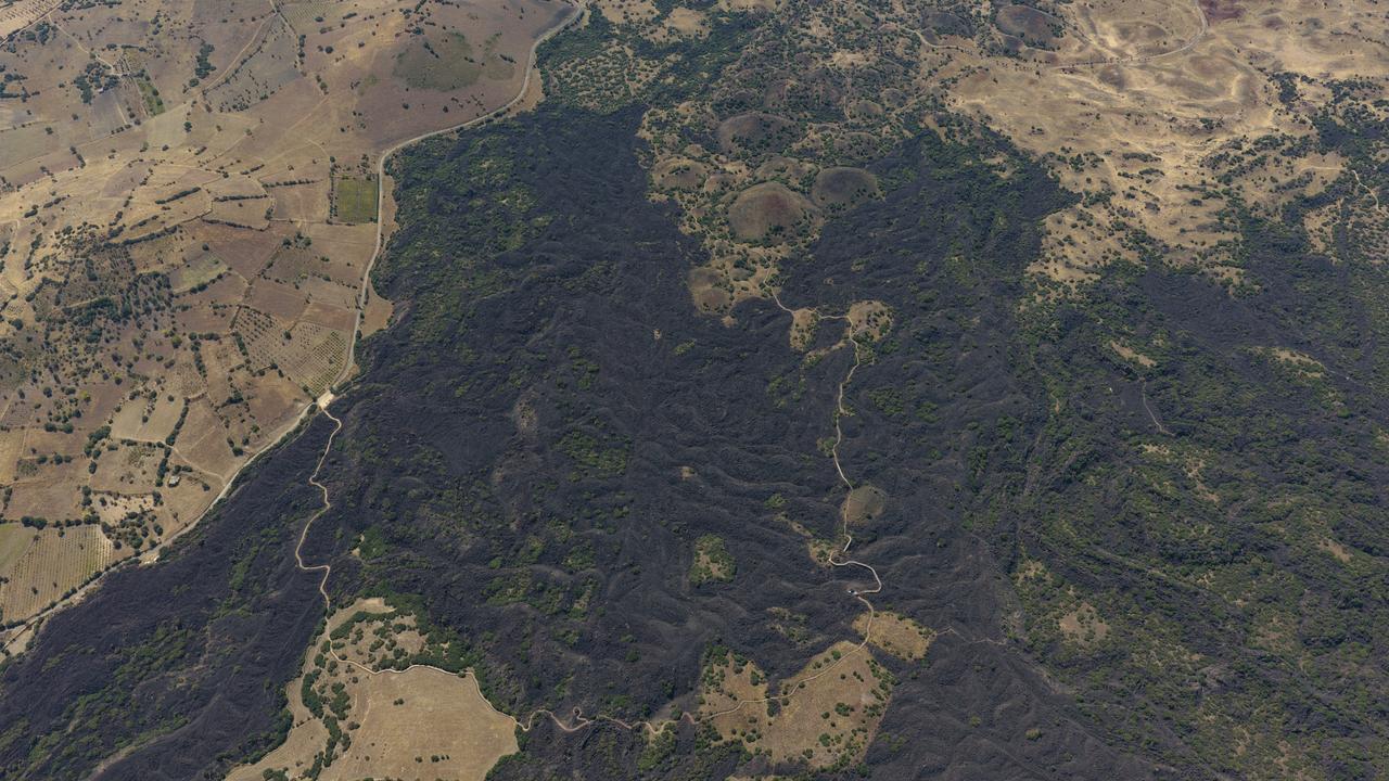An aerial view shows the dark volcanic landscape of Kula in Manisa, part of the region ancient geographer Strabo described as Katakekaumene, or "the burned land." (AA Photo)